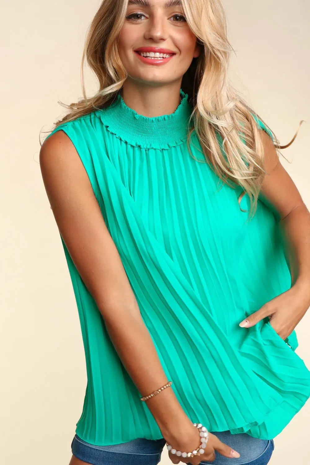 Haptics Smocked Mock Neck Pleated Sleeveless Top sold by Charming Charlie