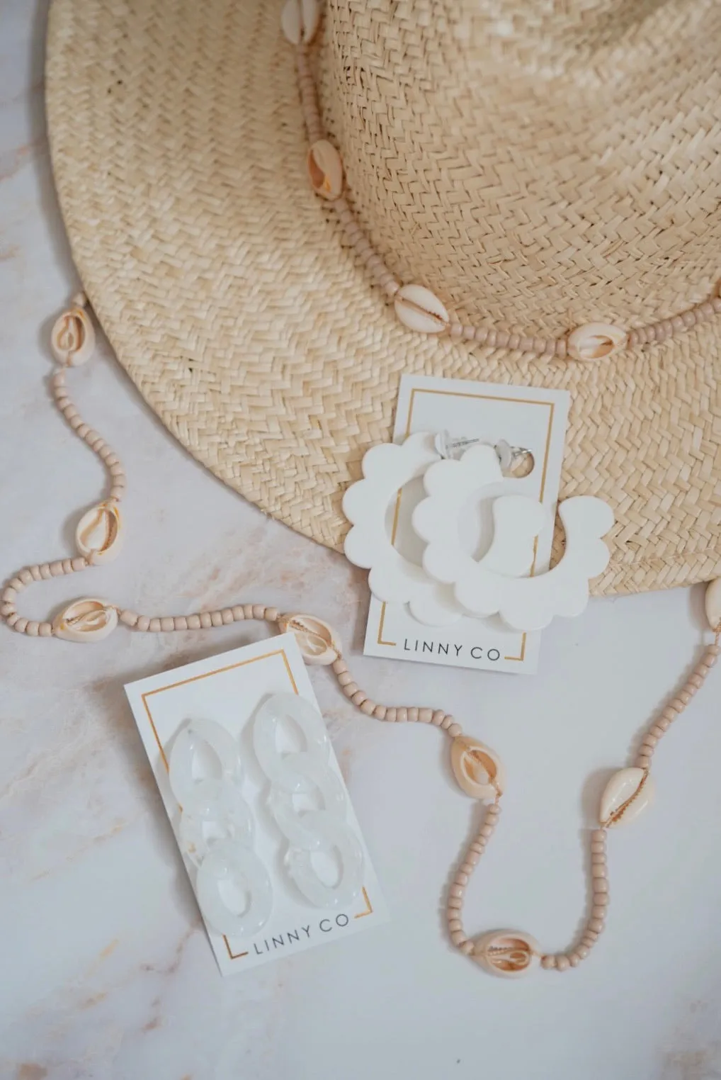 Claire - White/Clear sold by Charming Charlie product image thumbnail 4
