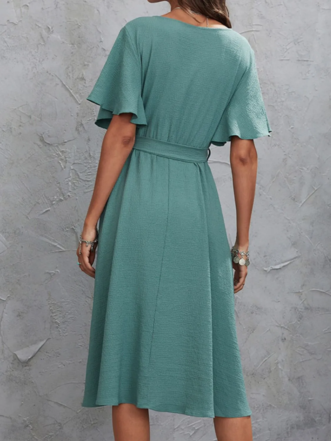Surplice Flutter Sleeve Midi Dress sold by Charming Charlie product image thumbnail 2