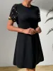 Sequin Round Neck Short Sleeve Mini Dress sold by Charming Charlie