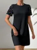 Sequin Round Neck Short Sleeve Mini Dress sold by Charming Charlie