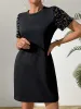 Sequin Round Neck Short Sleeve Mini Dress sold by Charming Charlie