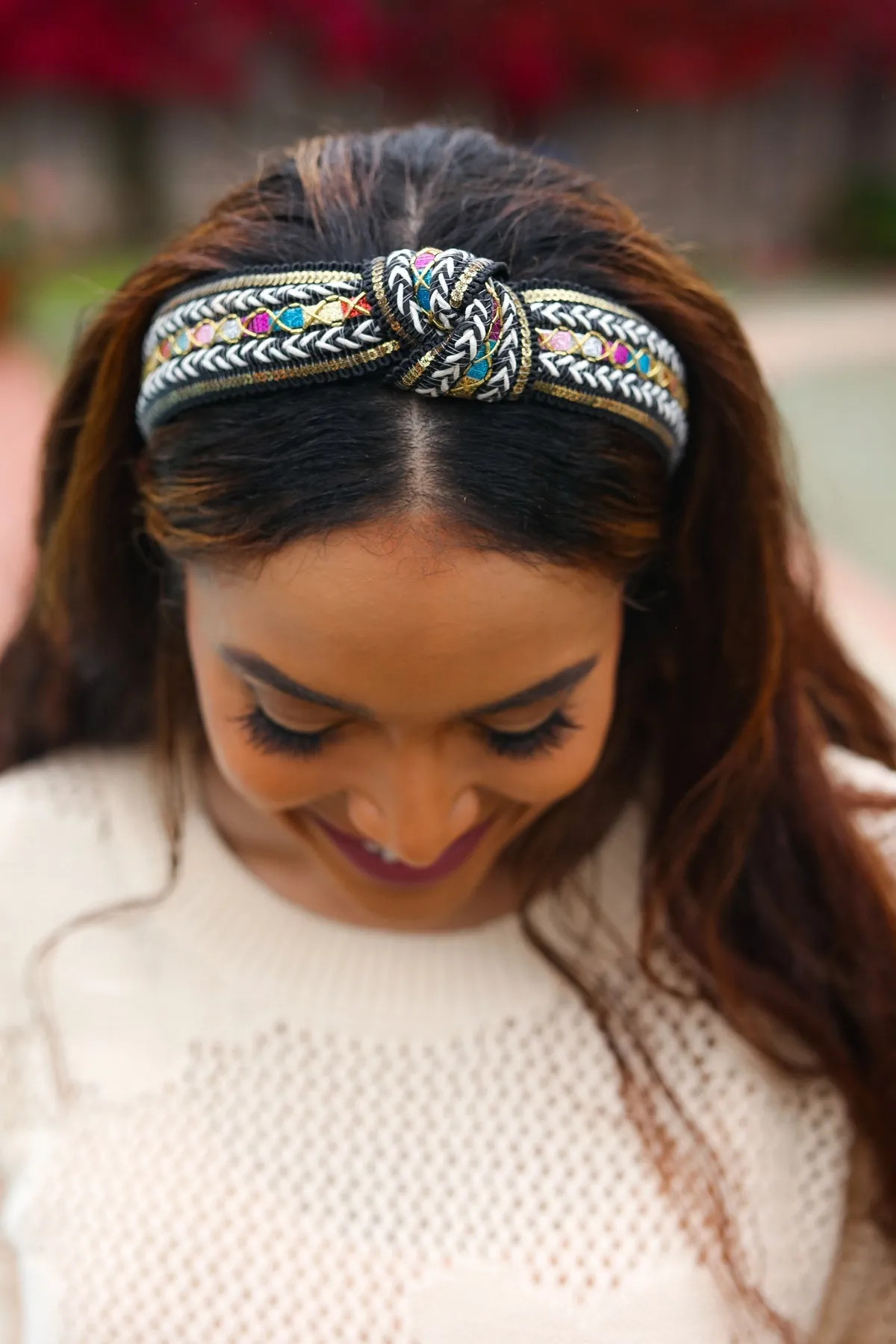 Black Sequin & Multicolor Glitter Boho Top Knot Headband sold by Charming Charlie