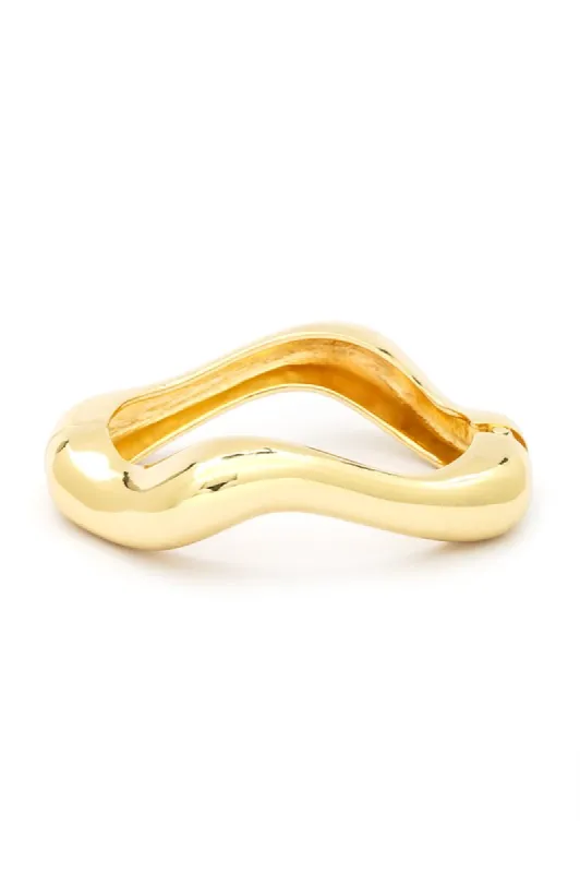 Wavy Iconic Gold Tone Hinged Bangle sold by Charming Charlie