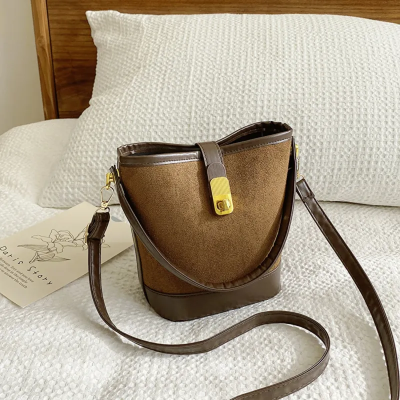 PU Leather Bucket Crossbody Bag sold by Charming Charlie