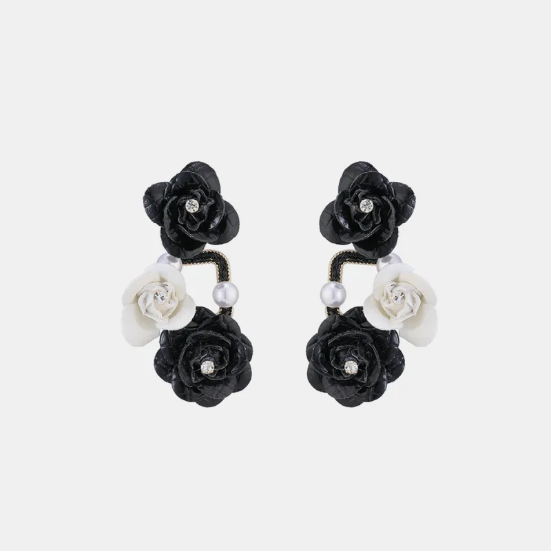Rhinestone PU Leather Flower Earrings sold by Charming Charlie