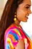 Yellow Raffia Lantern Pom Dangle Earrings sold by Charming Charlie