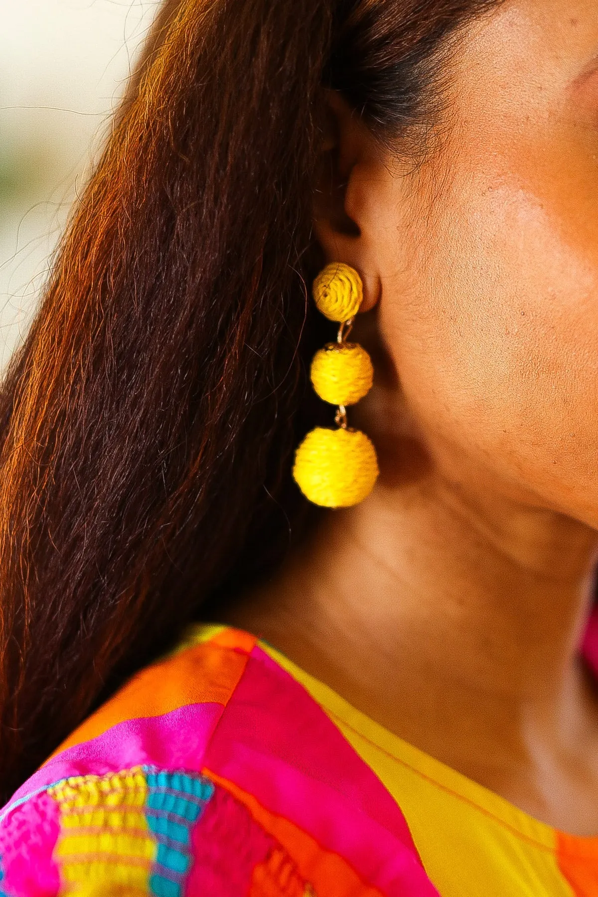 Yellow Raffia Lantern Pom Dangle Earrings sold by Charming Charlie product image thumbnail 2