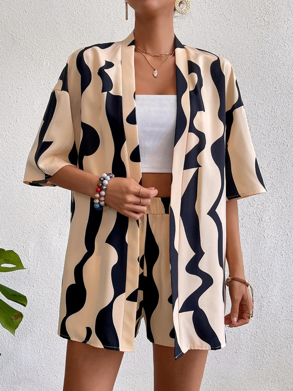 Printed Half Sleeve Top and Shorts Set sold by Charming Charlie