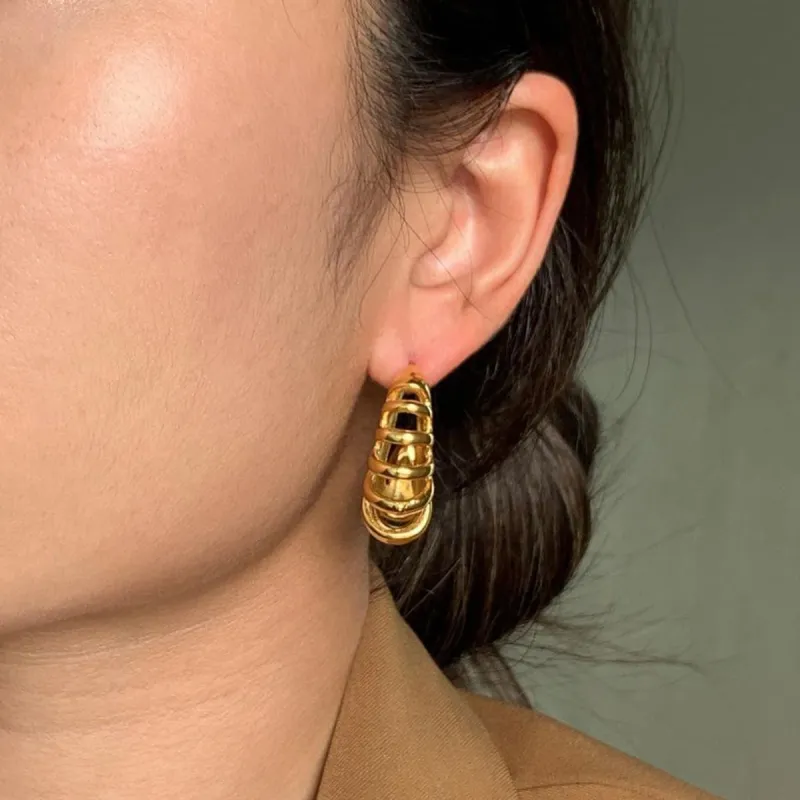 Stainless Steel Cutout C-Hoop Earrings sold by Charming Charlie