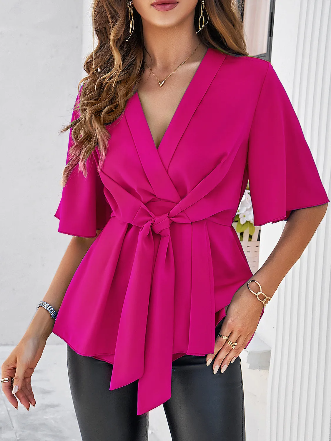 Surplice Tie Waist Half Sleeve Blouse sold by Charming Charlie