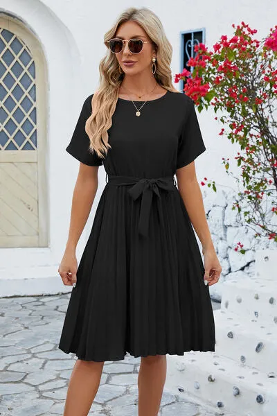 Pleated Tie Waist Short Sleeve Dress sold by Charming Charlie