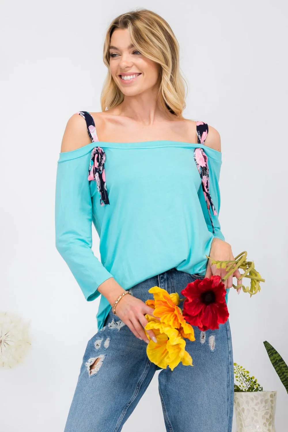 Celeste Full Size Tie-Strap Off-Shoulder Blouse sold by Charming Charlie