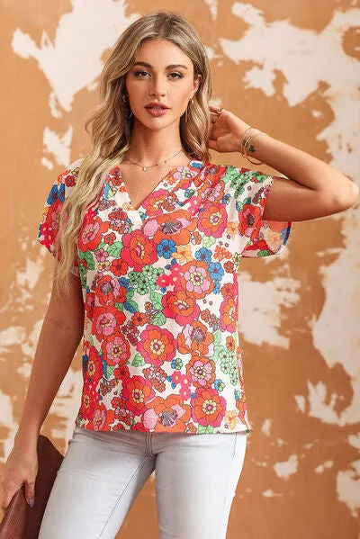 Printed Notched Short Sleeve Blouse sold by Charming Charlie