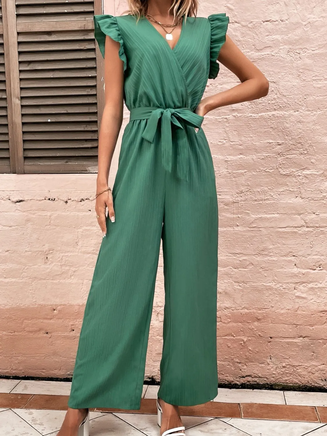 Ruffled Surplice Cap Sleeve Jumpsuit sold by Charming Charlie