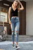 BAYEAS High Waist Distressed Washed Cropped Mom Jeans sold by Charming Charlie