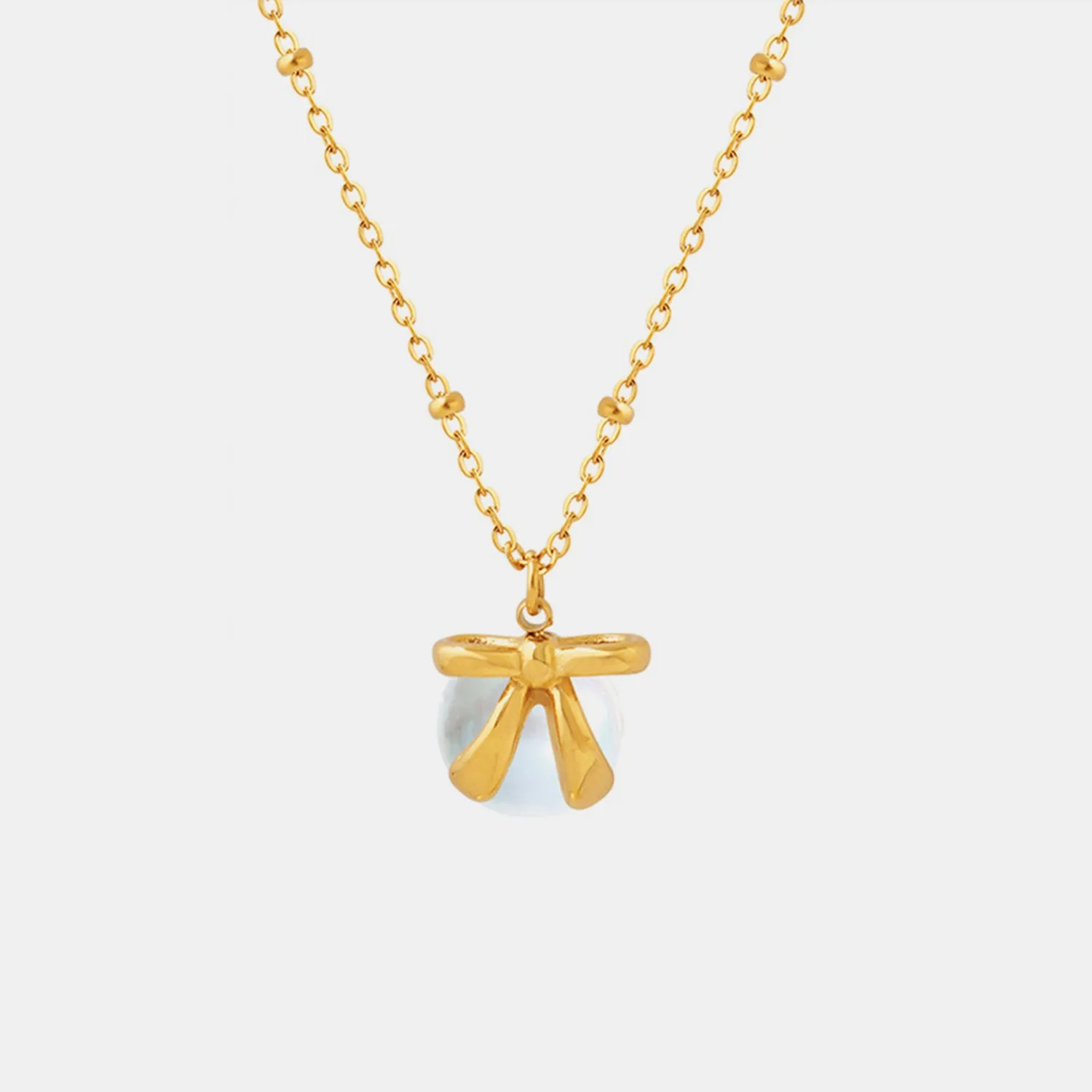 Titanium Steel Bow & Bead Pendant Necklace sold by Charming Charlie product image thumbnail 5