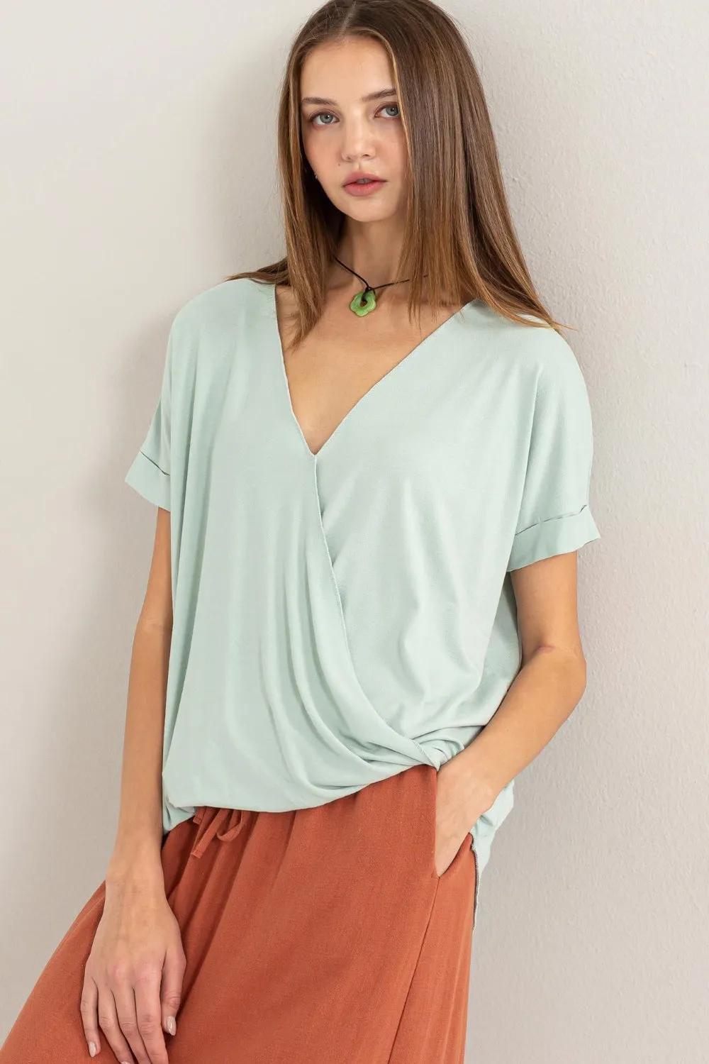 HYFVE Short Sleeve Surplice Top sold by Charming Charlie