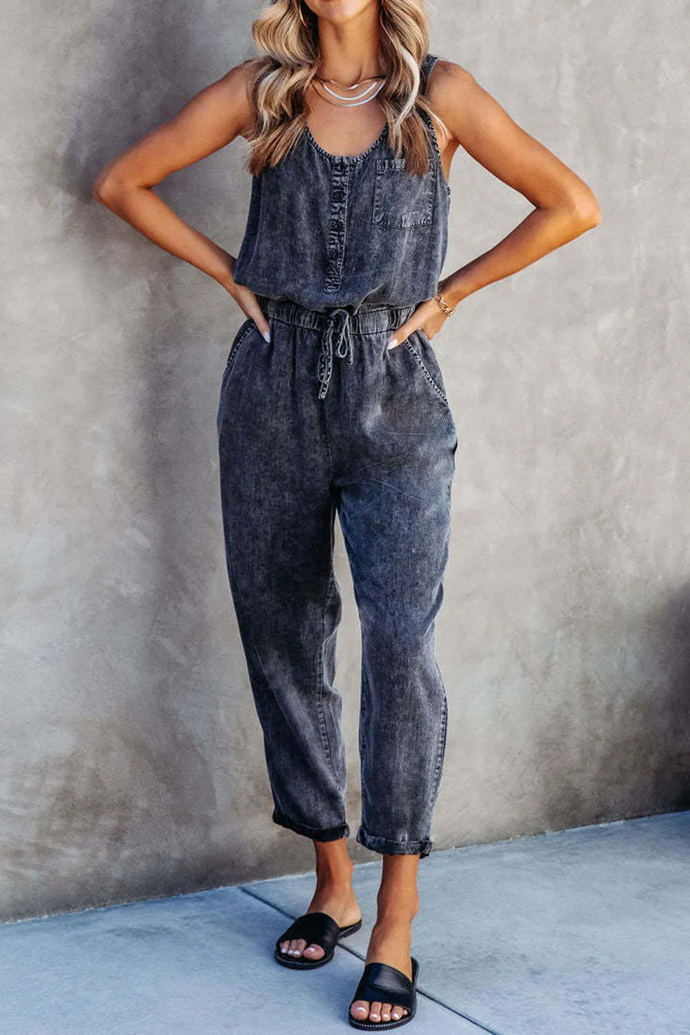 Pocketed Half Button Sleeveless Denim Jumpsuit sold by Charming Charlie product image thumbnail 4