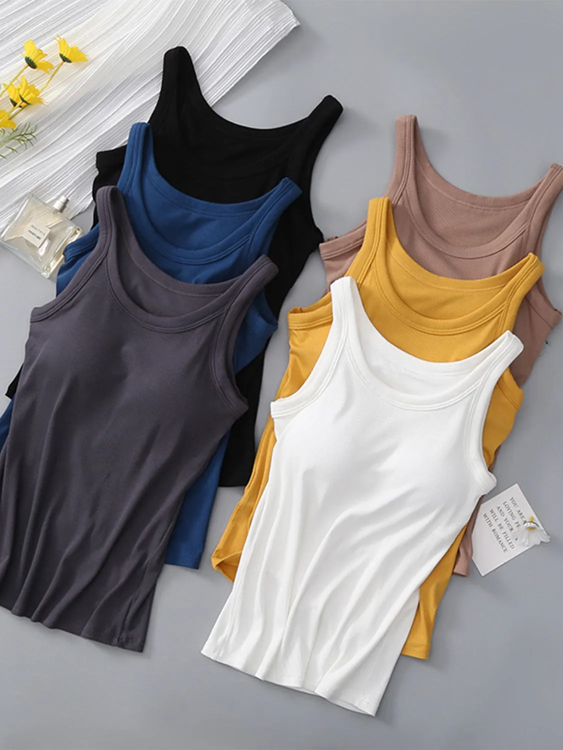 Round Neck Tank with Bra sold by Charming Charlie