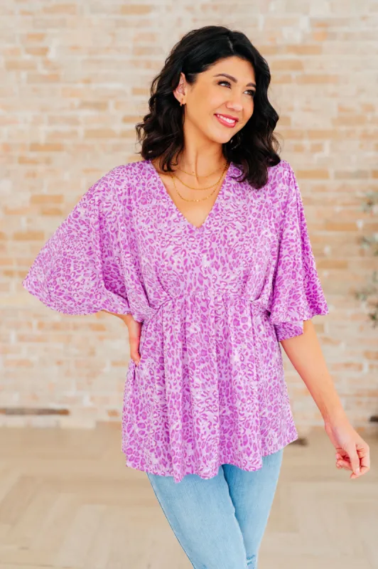 Dreamer Peplum Top in Lavender Leopard sold by Charming Charlie