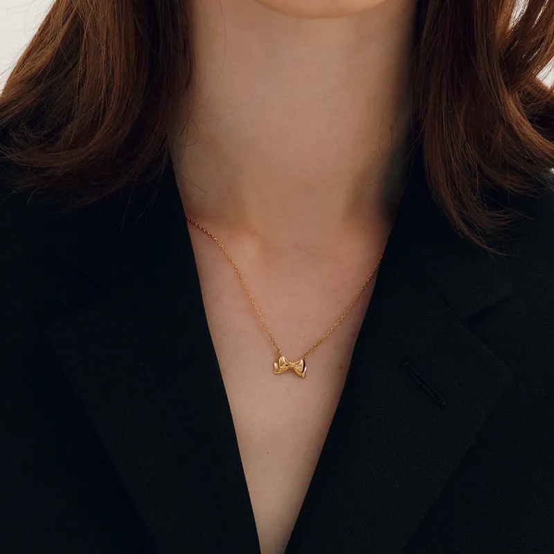 18K Gold-Plated Stainless Steel Bow Necklace sold by Charming Charlie