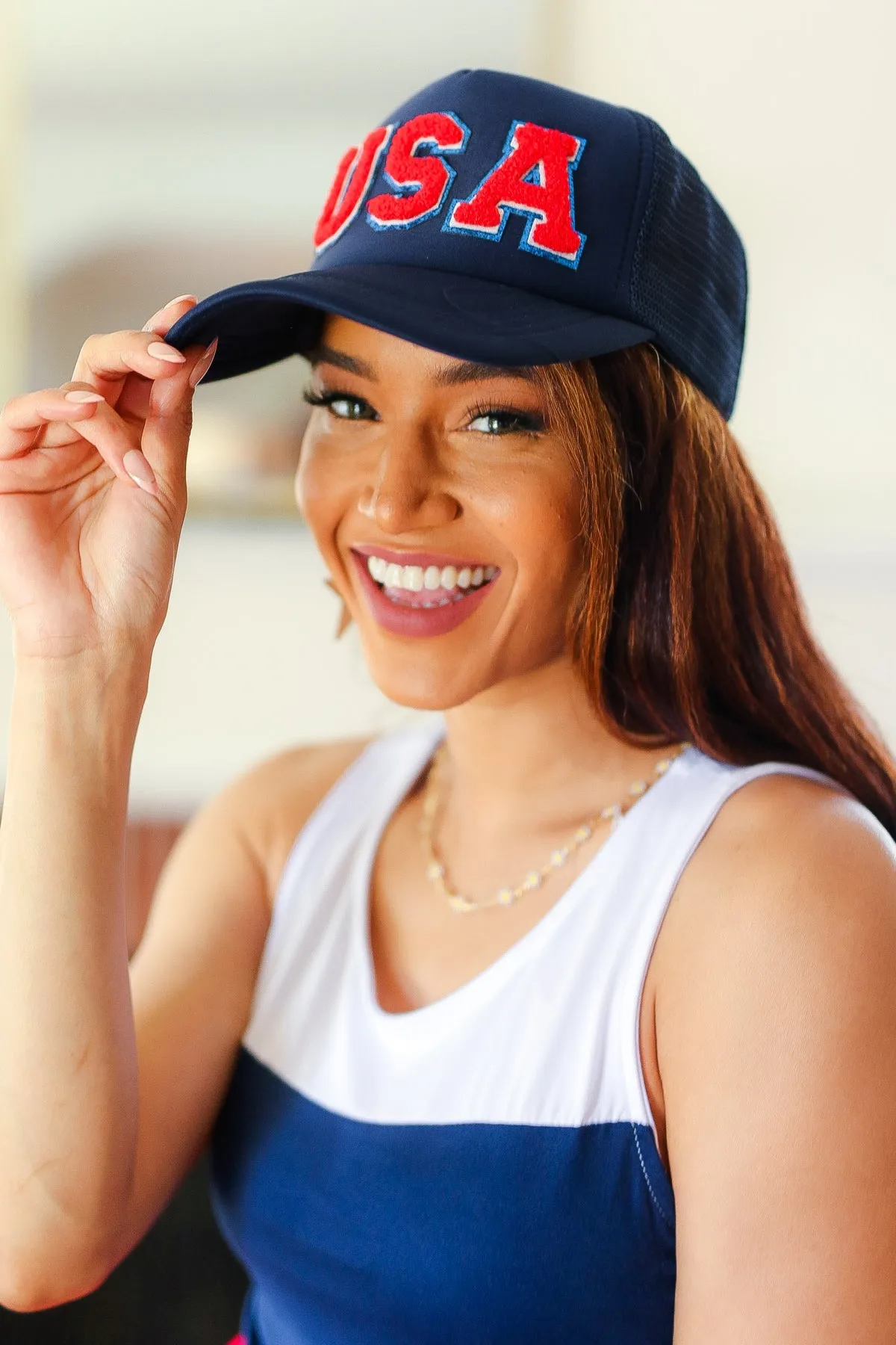 Navy "USA" Mesh Trucker Hat sold by Charming Charlie