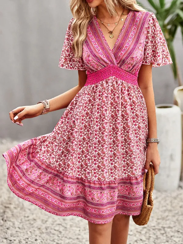 Floral Smocked Waist Short Sleeve Mini Dress sold by Charming Charlie