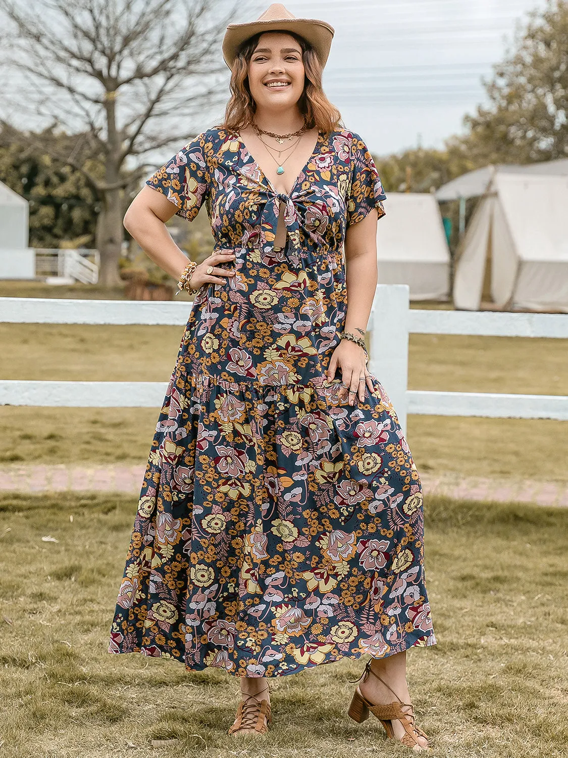 Plus Size Tied Printed Short Sleeve Midi Dress sold by Charming Charlie