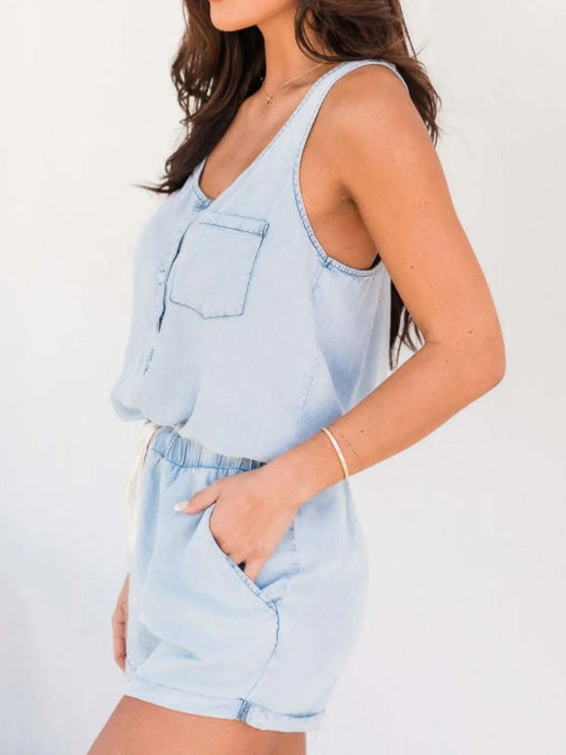 Pocketed Half Button Sleeveless Denim Romper sold by Charming Charlie product image thumbnail 3