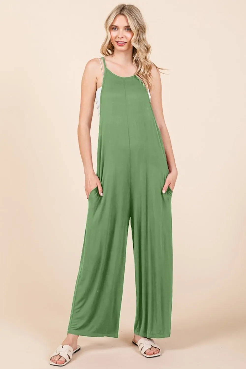 Culture Code Full Size Sleeveless Wide Leg Jumpsuit with Pockets sold by Charming Charlie