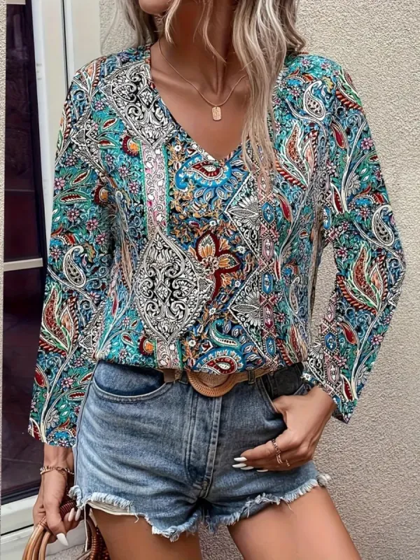 Printed V-Neck Long Sleeve Blouse sold by Charming Charlie