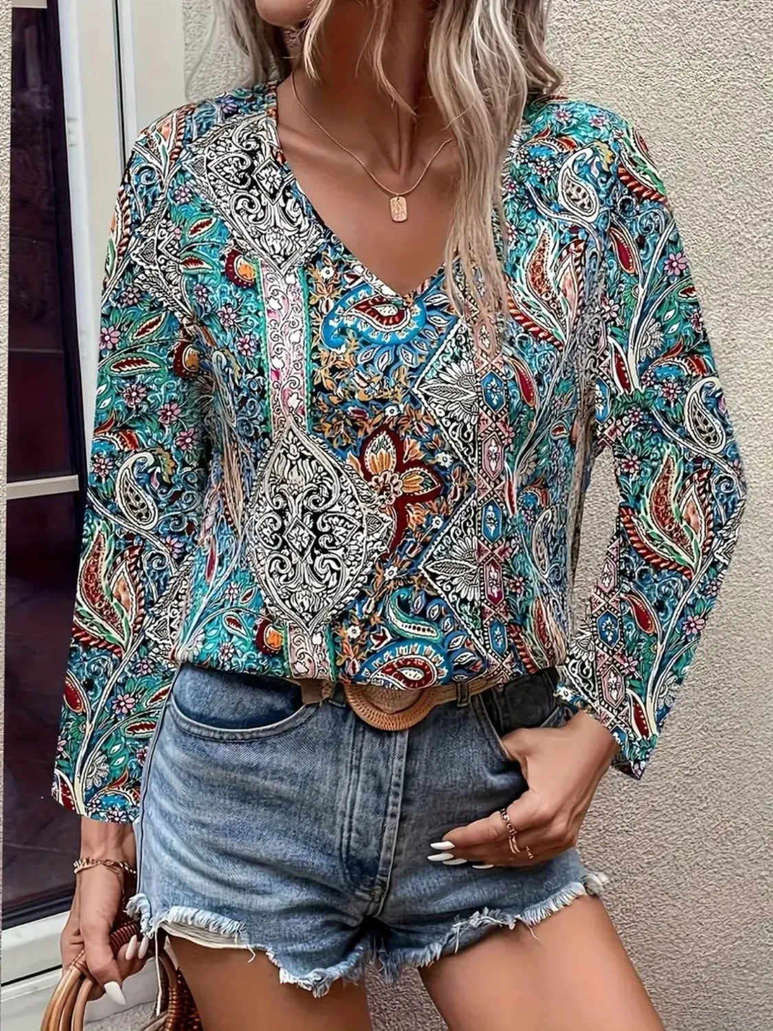 Printed V-Neck Long Sleeve Blouse sold by Charming Charlie
