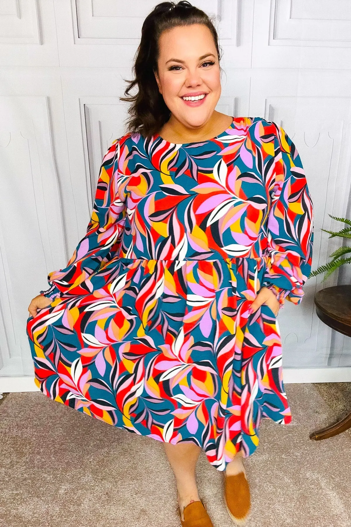 Perfectly You Teal Abstract Smocked Bubble Sleeve Dress sold by Charming Charlie