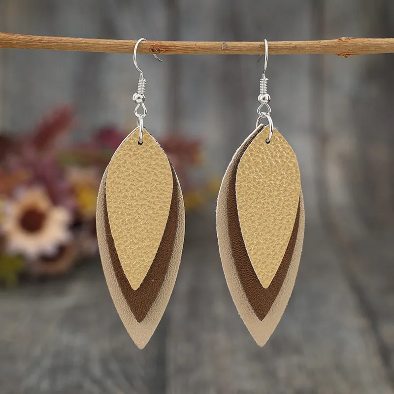 PU Leather Leaf Shape Earrings sold by Charming Charlie