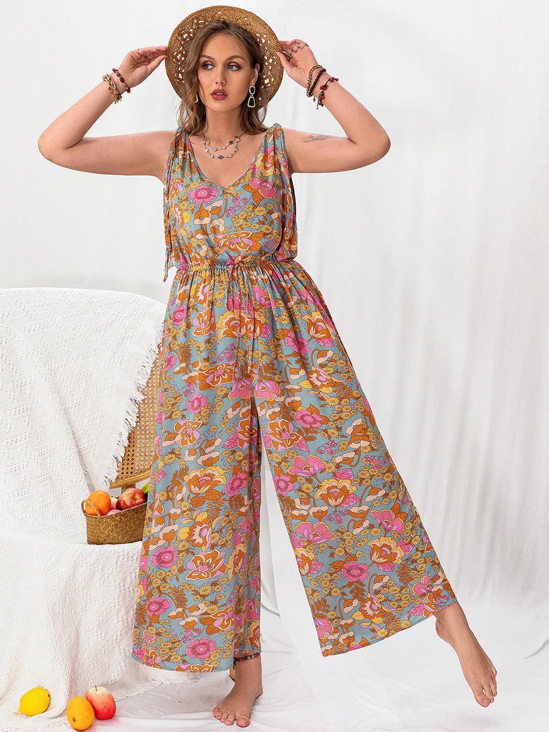Plus Size Printed Wide Leg Sleeveless Jumpsuit sold by Charming Charlie