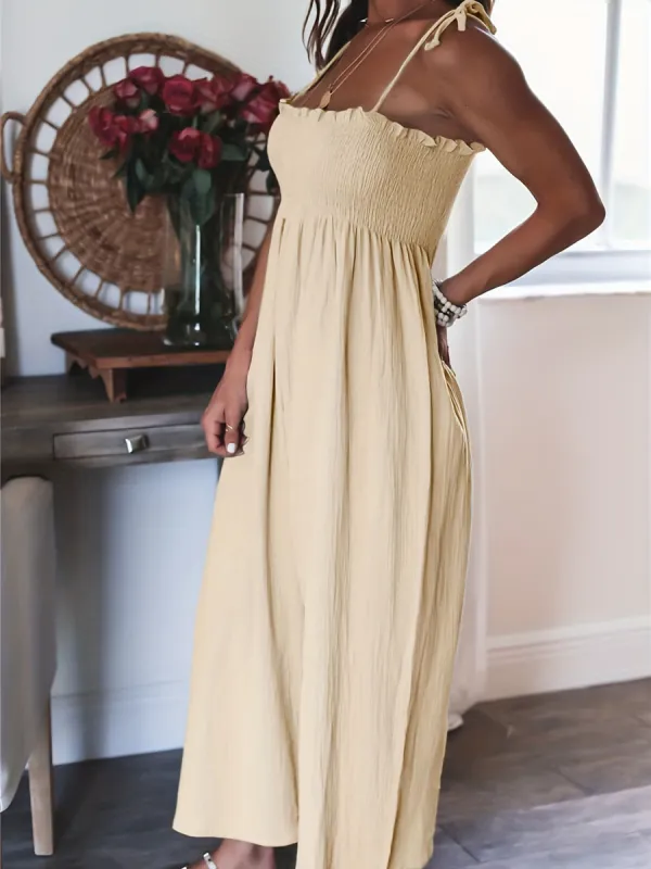 Full Size Smocked Spaghetti Strap Wide Leg Jumpsuit sold by Charming Charlie