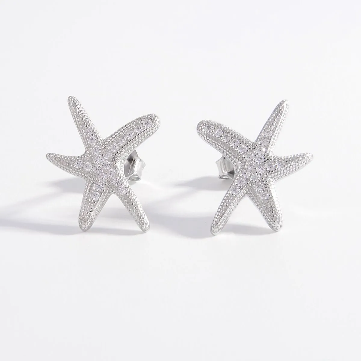 925 Sterling Silver Inlaid Zircon Starfish Earrings sold by Charming Charlie