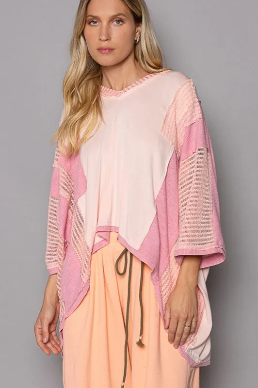 Oversize High-Low Contrast V-Neck 3/4 Sleeve Top sold by Charming Charlie