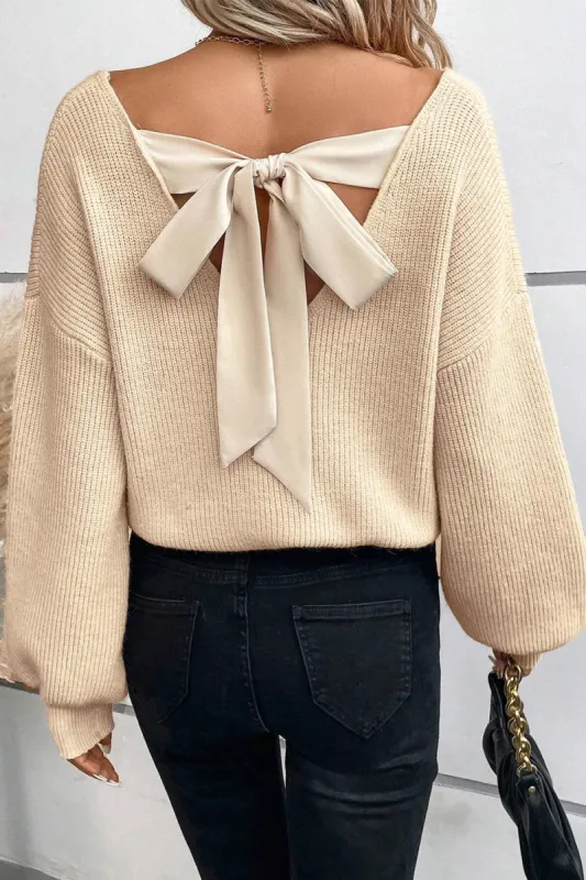 Tied V-Neck Long Sleeve Sweater sold by Charming Charlie