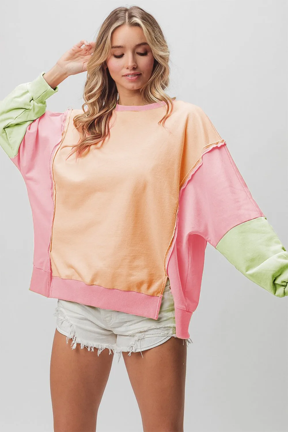 BiBi Washed Color Block Sweatshirt sold by Charming Charlie
