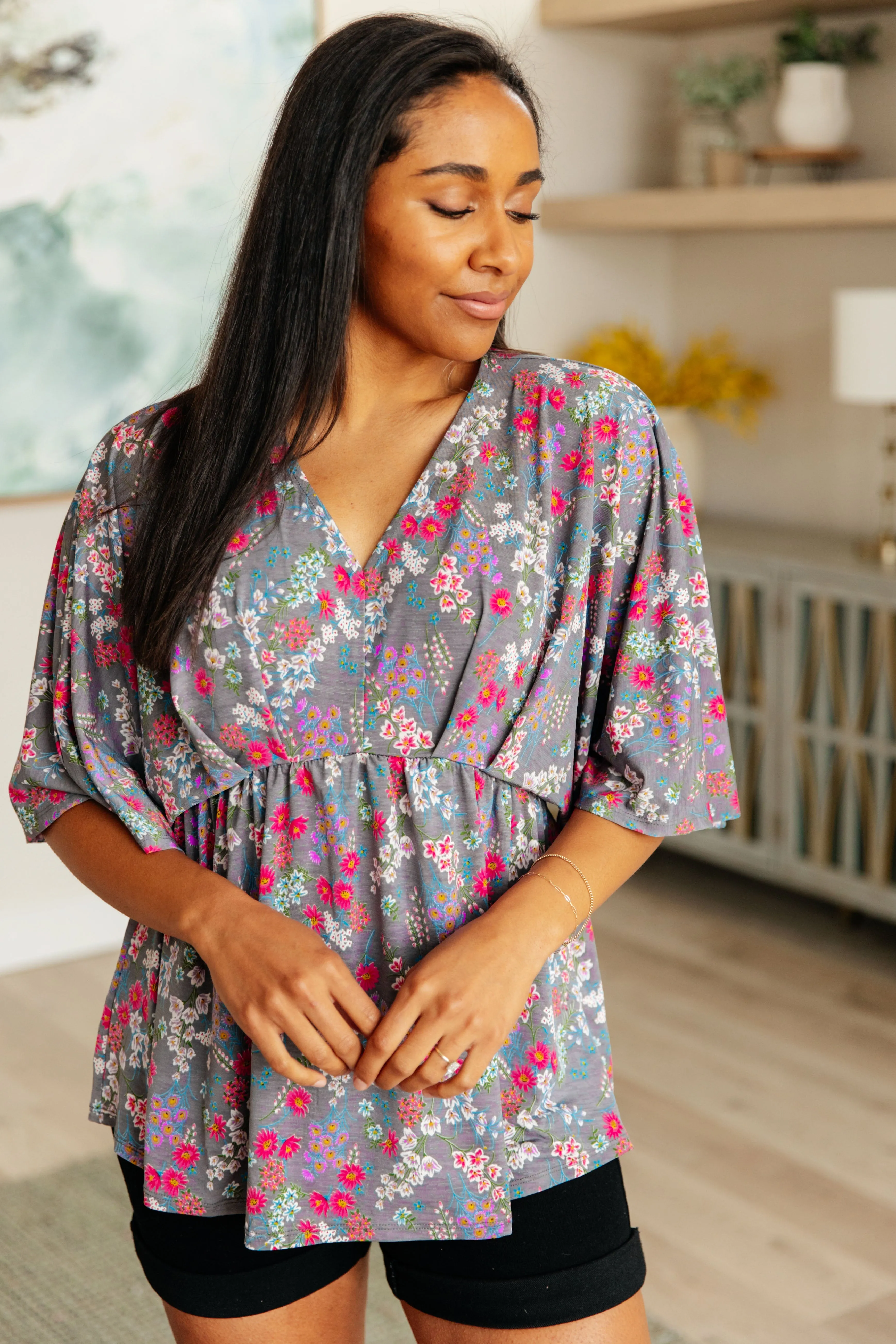 Dreamer Peplum Top in Grey and Pink Floral sold by Charming Charlie