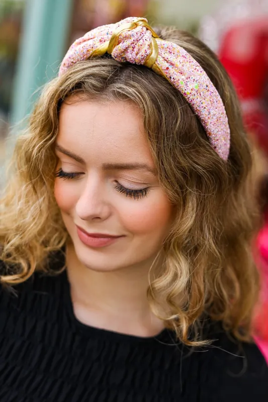 Pink & Gold Glitter Top Knot Headband sold by Charming Charlie