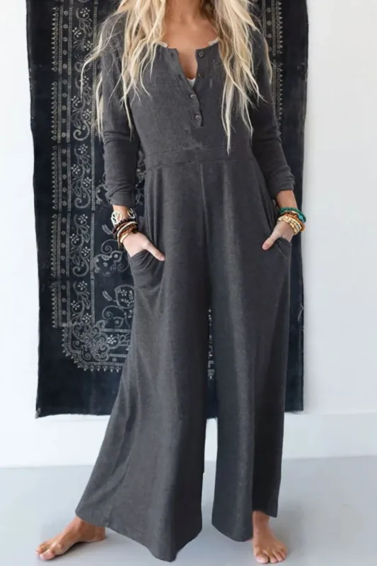 Pocketed Long Sleeve Wide Leg Jumpsuit sold by Charming Charlie