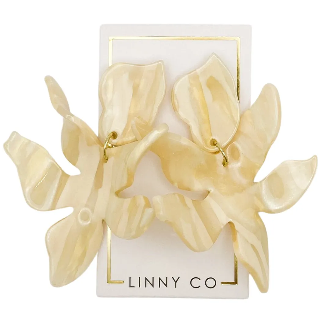 Flora - Champagne Sparkle sold by Charming Charlie