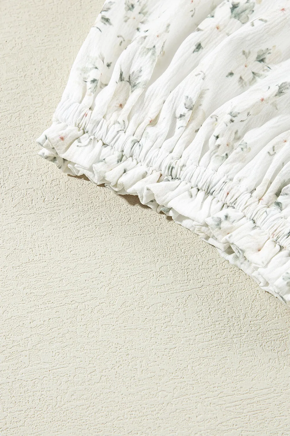 Smocked Printed Short Sleeve Jumpsuit sold by Charming Charlie product image thumbnail 5