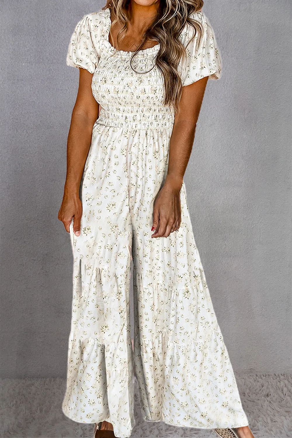 Smocked Printed Short Sleeve Jumpsuit sold by Charming Charlie