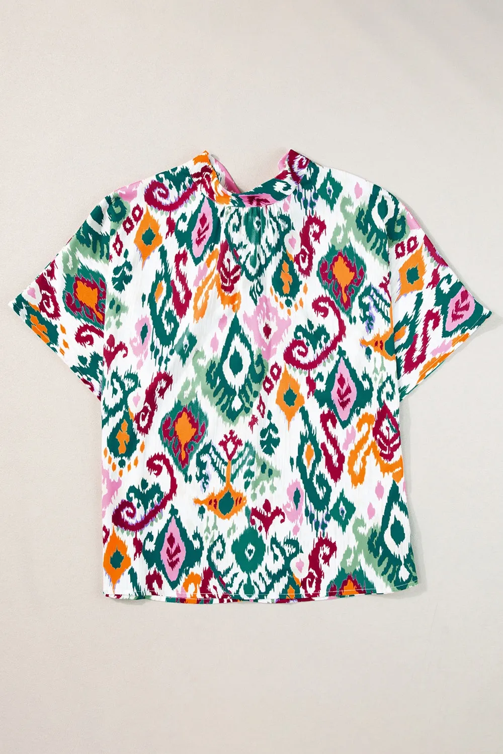 Printed Mock Neck Half Sleeve Blouse sold by Charming Charlie product image thumbnail 5