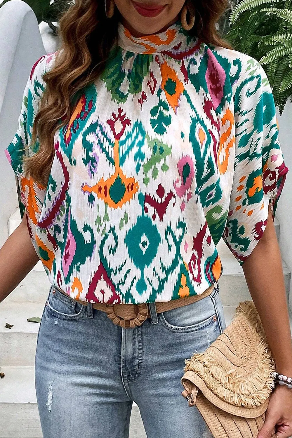 Printed Mock Neck Half Sleeve Blouse sold by Charming Charlie