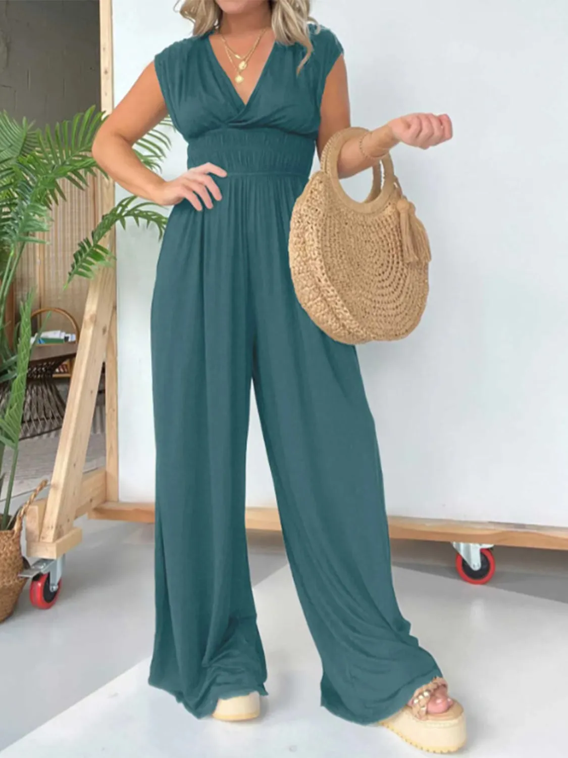 Smocked Cap Sleeve Wide Leg Jumpsuit sold by Charming Charlie product image thumbnail 5